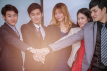 Obraz premium blurred on business team making hand coordination