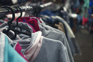 Obraz premium clothes hanging on a hanger in a store