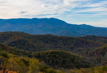 sunny day in the mountains looking at fall colors