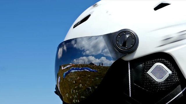 Detial of Paragliders waiting to launch from the ridge of a mountain
