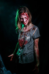 portrait of horrible zombie woman with wounds. Horror. Halloween poster.