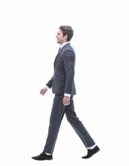 .confident businessman goes forward.side view.