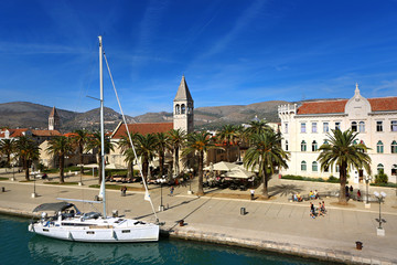 Fototapeta na wymiar Trogir port with sail boat docked in front of St. Dominic church, Croatia