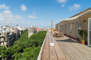 Fototapeta na wymiar Large terrace and view of city