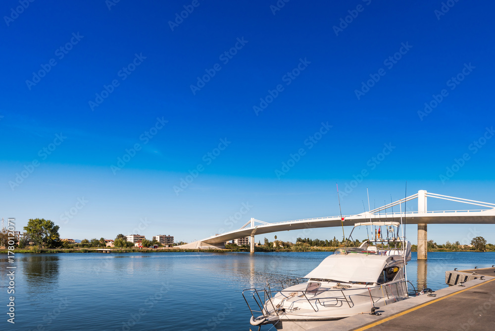 Wall mural sant jaume d'enveja new bridge 'lo passador' over ebro river ebro delta, tarragona, catalonia, spain