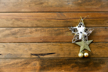 Christmas background with decorations on wooden table.