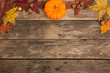 Fall background copy space pumpkin acorn wooden table