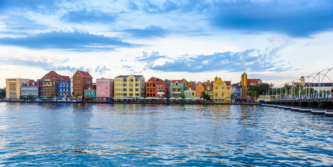 Fototapeta na wymiar Colorful Buildings in Willemstad downtown, Curacao, Netherlands Antilles, a small Caribbean island - travel destination for cruise ships or vacation