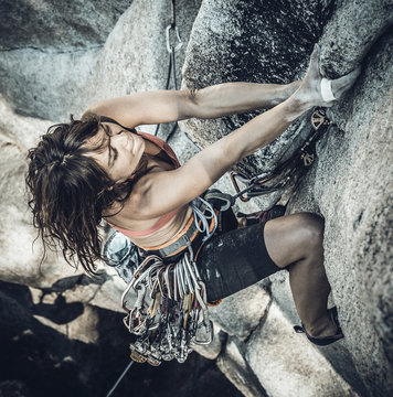 Female climber determined to succeed.