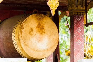 Naklejka premium Decorated drum in the temple Wat Sensoukaram in Louangphabang, Laos. Close-up.