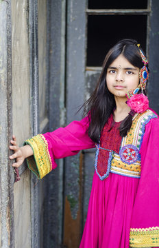 A little girl in ornate Balcohi Dress !