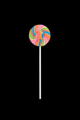Swirl lollipop isolated on black background.