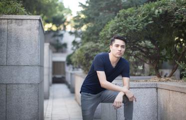 Handsome Latin Hispanic Male Resting on One Leg Up