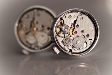 Cufflinks with watch mechanism