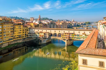 Deurstickers Ponte Vecchio Ponte Vecchio over de rivier de Arno in Florence