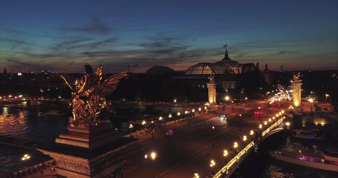Paris night aerial Alexander III bridge 