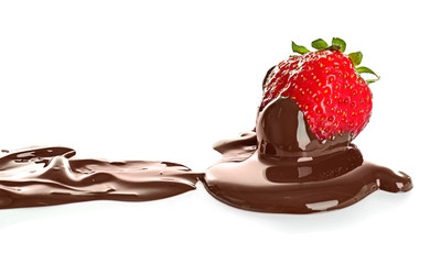 Tasty strawberry with melted chocolate on white background