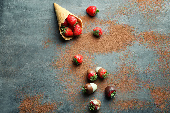 Composition with tasty glazed strawberries on table