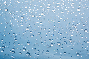 Water drops on glass, closeup