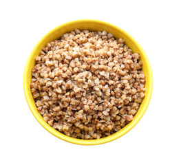 Bowl with cooked buckwheat on white background