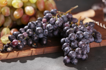 Fresh ripe grapes on table