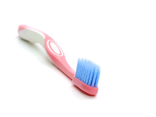 multicolored toothbrushes isolated on white background