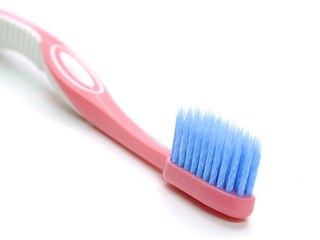 multicolored toothbrushes isolated on white background