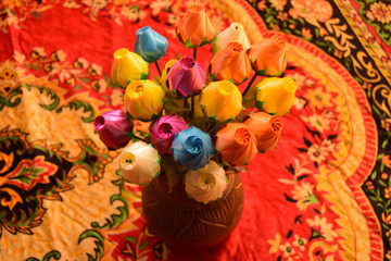 Obraz na płótnie Canvas Artificial flowers made from colorful plastic. 