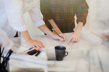Architects working with drawing sketch project plan blueprint. Cooperation Corporate Achievement Planning Design Draw Teamwork