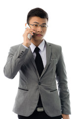 Portrait of a business man with glasses and smart phone. Isolated on white background