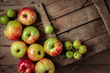 Fresh apples on an old box