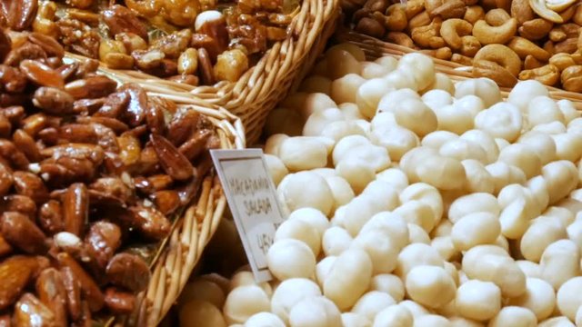Mixture of dry fruits Raisins and nuts in the market La Boqueria in Barcelona,Spain