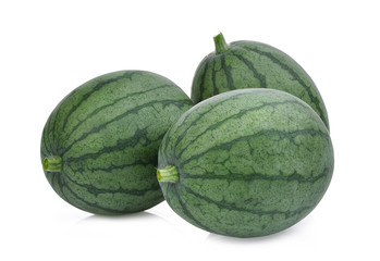 three whole young small watermelon isolated on white background