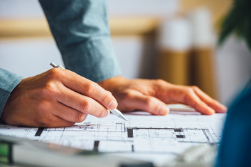 Architect working on his plans