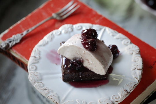 Cocoa bean Brownie, cherry panna cotta, cherry compote