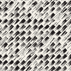 Vector seamless pattern with brush stripes and strokes. Black and white background with ink elements. Hand painted grunge texture.