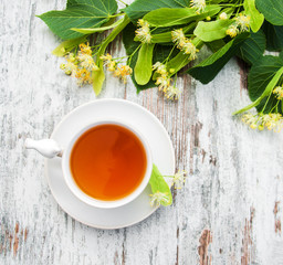 cup of herbal tea with linden flowers