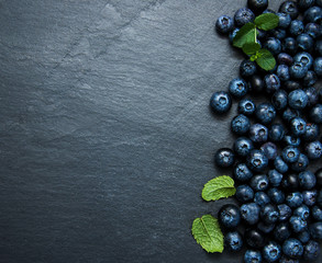 Fresh blueberries on a stone background