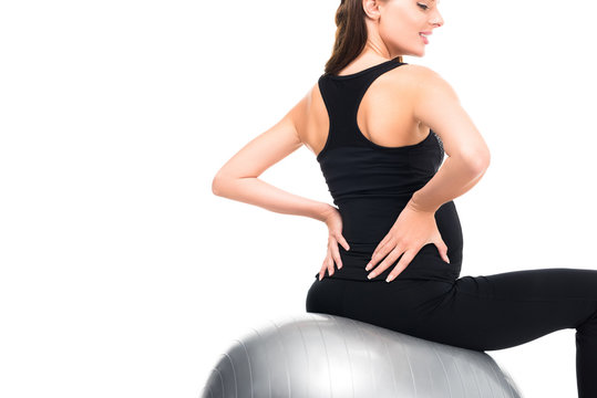 pregnant woman exercising on fitness ball