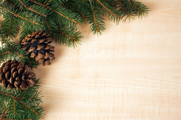 Christmas tree on light wooden background , Christmas background