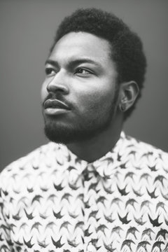 Black and white portrait of modern young black man.