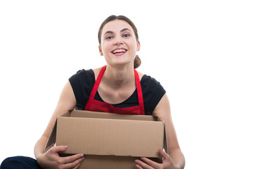 Obraz premium Female merchandiser looking satisfied of her delivery