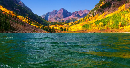 Mountain Lake With Yellow Fall Foliage And Blue Sky - Maroon Bells, Colorado, USA