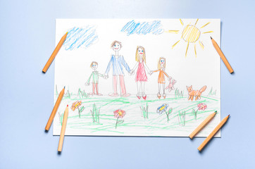 Children's drawing and color pencils top view