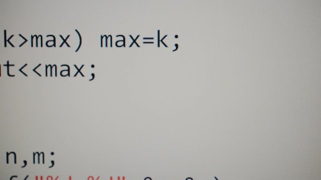 Source code on the monitor screen.