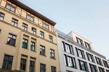 Fototapeta premium orange and white modern apartments exterior