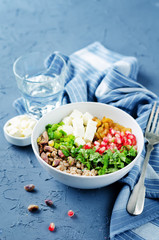 Barley pomegranate raisins feta salad