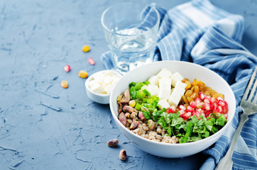 Barley pomegranate raisins feta salad