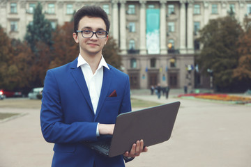 Fototapeta premium student with a laptop