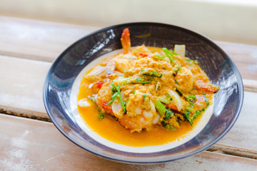 Sea-food, shrimp in yellow curry,